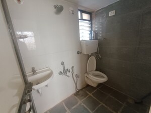 Bathroom in 1 BHK Apartment at Prithvi Srishti Complex, Tembhode – for Sale