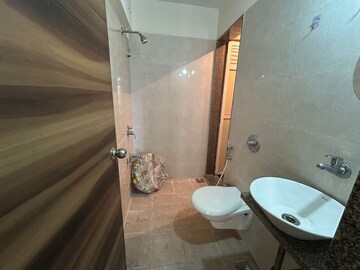 Bathroom in 1 BHK Apartment at Metropolis Rivera, Kasarvadavali – for Rent