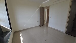 Room in 2 BHK Apartment at Neelsiddhi Residency, Sector 11 Kopar Khairane – for Rent