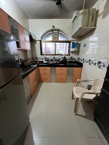 Kitchen in 2 BHK Apartment at Amrut Park CHS, Kalyan West – for Sale