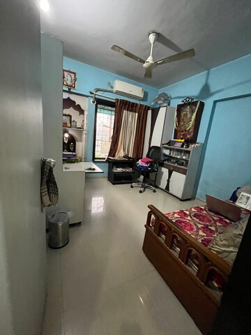 Living Room in 2 BHK Apartment at Amrut Park CHS, Kalyan West – for Sale
