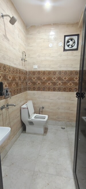 Bathroom in 3 BHK Builder Floor at Dwarka Mor – for Rent