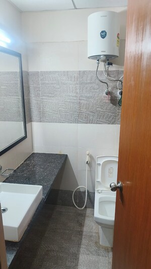 Bathroom in 1 BHK Apartment at Paramount Golfforeste, Zeta I Greater Noida – for Rent