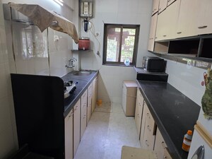 Kitchen in 2 BHK Apartment at Noble Apartments, Santacruz East – for Rent