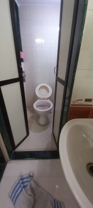 Attached Bathroom in 1 BHK Apartment at Ram Pushpanjali Residency, Owale – for Rent
