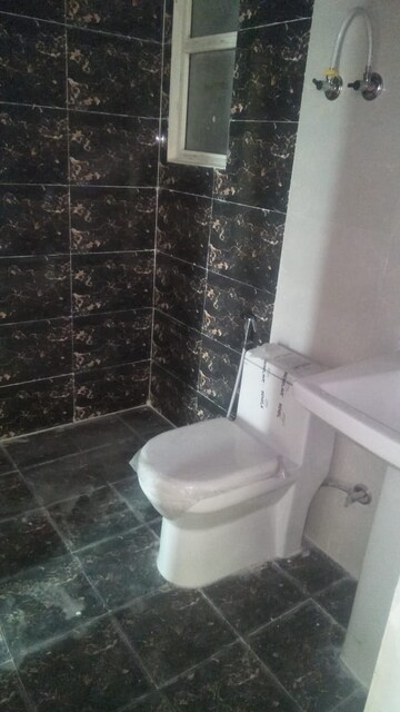 Bathroom in 1 BHK Apartment at VVIP Nest, Raj Nagar Extension – for Rent