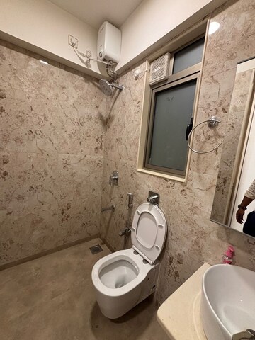 Bathroom in 2 BHK Apartment at Ruparel Ariana, Parel – for Rent