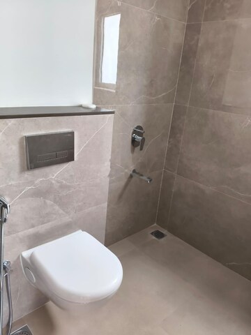 Bathroom in 1 BHK Apartment at Piramal Revanta, Mulund West – for Rent