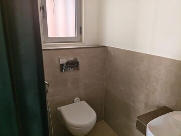 Bathroom in 1 BHK Apartment at Piramal Revanta, Mulund West – for Rent