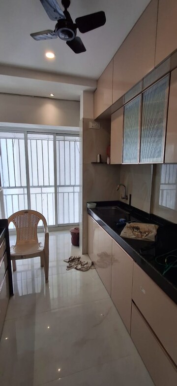 Kitchen in 3 BHK Apartment at Jay Amrat Apartment, Malad West – for Rent