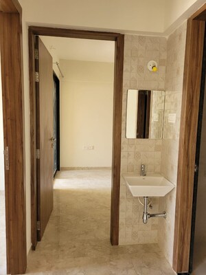 Bathroom in 2 BHK Apartment at Nexus Westpride, Punawale – for Rent
