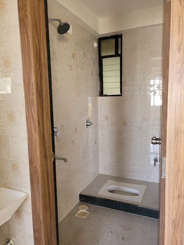 Bathroom in 2 BHK Apartment at Nexus Westpride, Punawale – for Rent