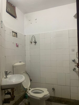 Bathroom in 1 BHK Apartment at Katwaria Sarai – for Rent