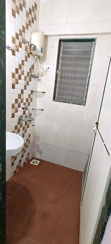 Bathroom in 1 BHK Apartment at Royal Nest Malad West, Malad West – for Rent