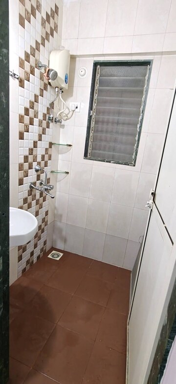 Bathroom in 1 BHK Apartment at Royal Royal Nest, Malad West – for Rent