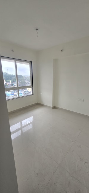 Room in 2 BHK Apartment at Ajmera Crosstown One, Kalyan West – for Rent