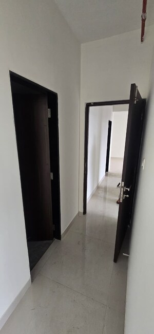 Building Lobby in 2 BHK Apartment at Ajmera Crosstown One, Kalyan West – for Rent