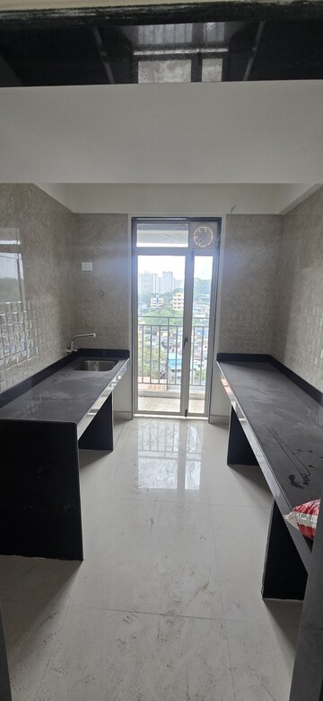 Kitchen in 2 BHK Apartment at Ajmera Crosstown One, Kalyan West – for Rent