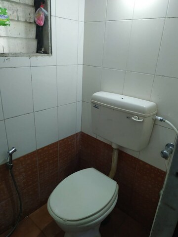 Bathroom in 1 BHK Apartment at Rodas Enclave Evergreen, Patlipada – for Rent