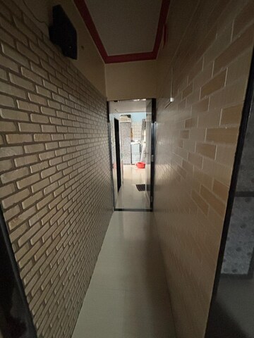 Building Lobby in 1 BHK Apartment at Rodas Enclave Evergreen, Patlipada – for Rent
