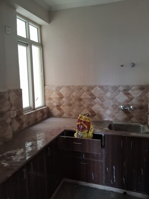 Kitchen in 3 BHK Apartment at Amrapali Golf Homes, Sector 4 Greater Noida – for Rent