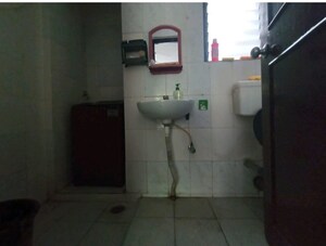 Bathroom in 2 BHK Apartment at Shivamrut Krupa Society, Kothrud – for Sale