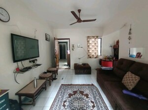 Living Room in 2 BHK Apartment at Shivamrut Krupa Society, Kothrud – for Sale