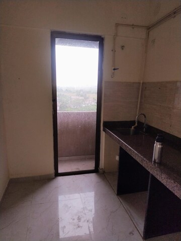 Kitchen in 1 BHK Apartment at Sunteck West World, Tivri – for Rent