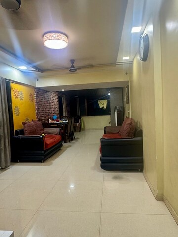 Living Room in 1 BHK Apartment at Shree Ashirwad CHS Kopar, Kopar Khairane – for Sale