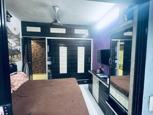 Bedroom in 1 BHK Apartment at Shree Ashirwad CHS Kopar, Kopar Khairane – for Sale