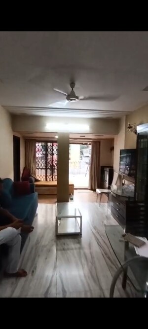 Living Room in 2 BHK Apartment at Parivar CHS Santacruz West, Santacruz West – for Sale
