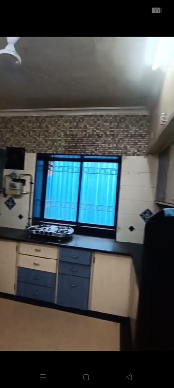 Kitchen in 2 BHK Apartment at Parivar CHS Santacruz West, Santacruz West – for Sale
