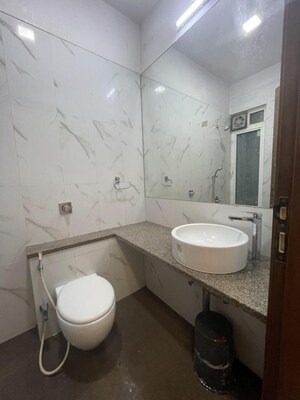 Bathroom in 3 BHK Apartment at Omkar Alta Monte, Malad East – for Rent