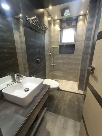 Bathroom in 3 BHK Apartment at Rustomjee OZone, Goregaon West – for Rent