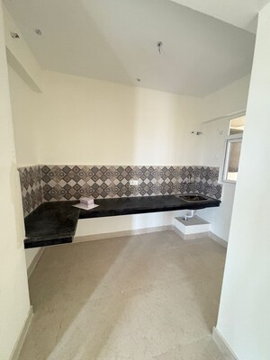 Kitchen in 2 BHK Apartment at Signature The Millennia 3, Sector 37d – for Rent