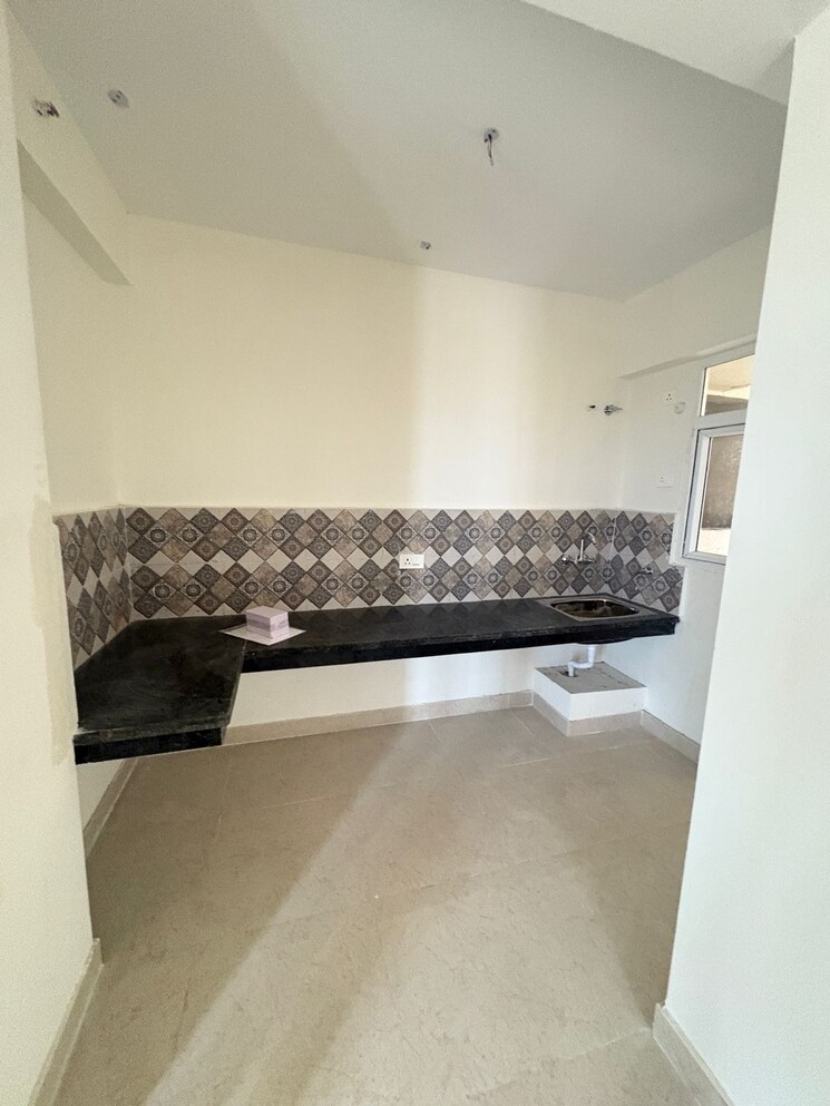 Kitchen, signature-the-millennia-3 2 Bedroom 601 Sq.Ft. Apartment In Sector 37d Gurgaon 9280137