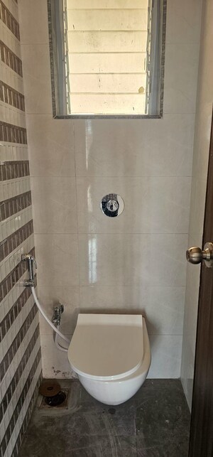 Bathroom in 1 BHK Apartment at Bhairaav Goldcrest Residency, Ghansoli – for Rent