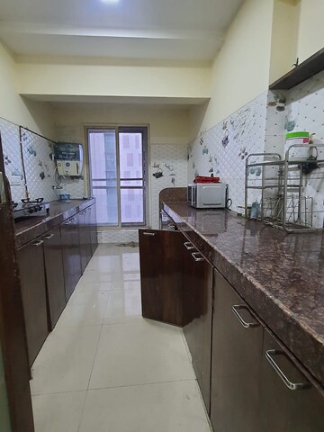Kitchen in 3 BHK Apartment at Ansal Heights, Worli – for Rent
