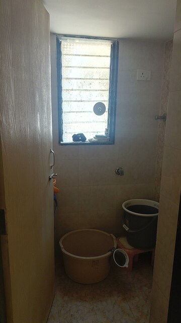 Bathroom in 1 BHK Apartment at Navkar Building, Nalasopara West – for Rent