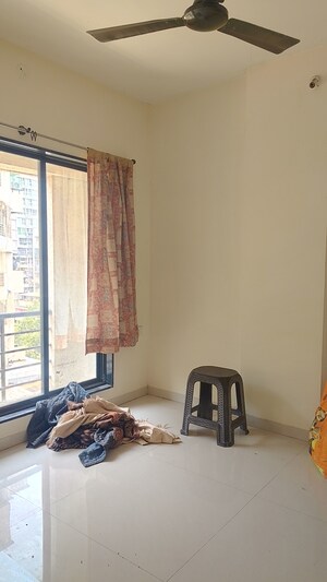 Living Room in 1 BHK Apartment at Navkar Building, Nalasopara West – for Rent