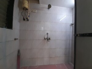 Bathroom in 1 BHK Apartment at Matrushri CHS, Goregaon West – for Rent