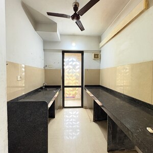 Kitchen in 2 BHK Apartment at Lodha Lakeshore Greens, Hedutane – for Sale