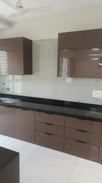 Kitchen in 2 BHK Apartment at Alankapuri CHS, Kothrud – for Rent