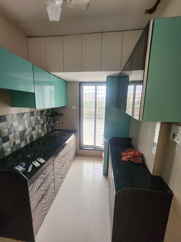 Kitchen, strawberry-the-address 2 Bedroom 640 Sq.Ft. Apartment In Kanakia Road Thane 9280795