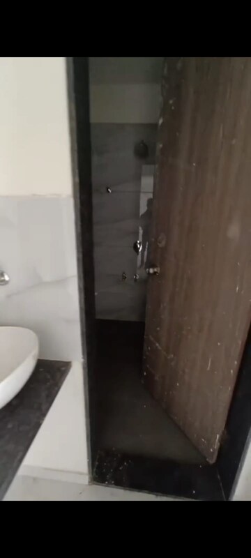 Bathroom in 1 BHK Apartment at Anant Metropolis Insignia Towers, Kasarvadavali – for Sale