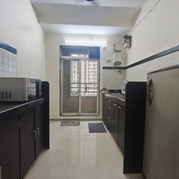 Kitchen in 2 BHK Apartment at Mahavir Kalpavruksha, Ghodbunder Road – for Rent