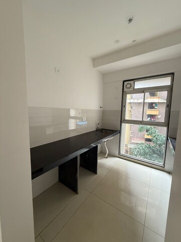Kitchen in 2 BHK Apartment at Godrej Nest Kandivali, Kandivali East – for Rent