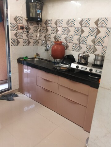Kitchen in 1 BHK Apartment at Shivlok CHS Majiwada, Majiwada – for Sale