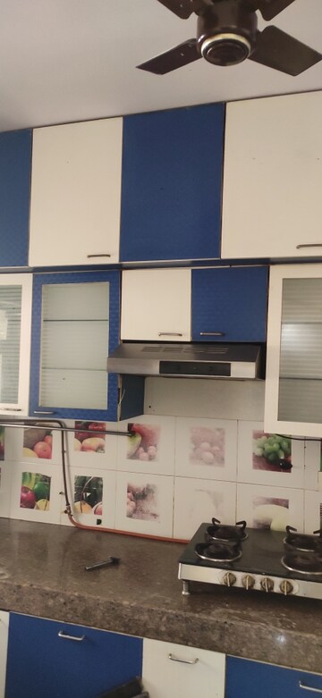Kitchen in 2 BHK Apartment at Kanakia Spaces Niharika, Manpada – for Rent
