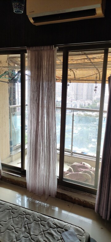 Building Lobby in 2 BHK Apartment at Kanakia Spaces Niharika, Manpada – for Rent